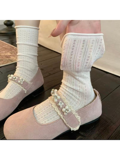 Rufia ribbed mid-calf socks displayed flat on white background