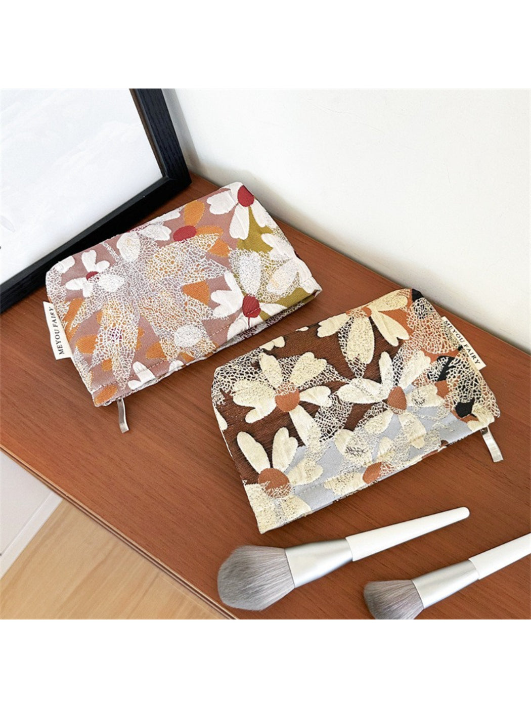 Top view of Cosbai floral makeup bag partially open