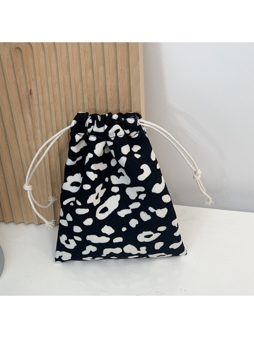 Cosbai Floral Pouch with bright floral motifs in various colors