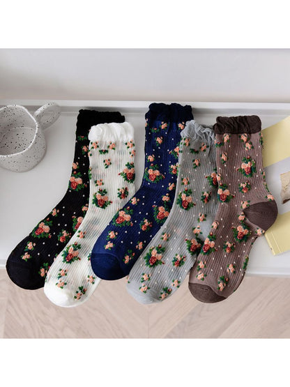 Pair of Rufia vintage rose floral crew socks laid flat showing full design