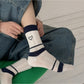 Rufia colourblock socks displayed flat highlighting heart motif and pastel colors