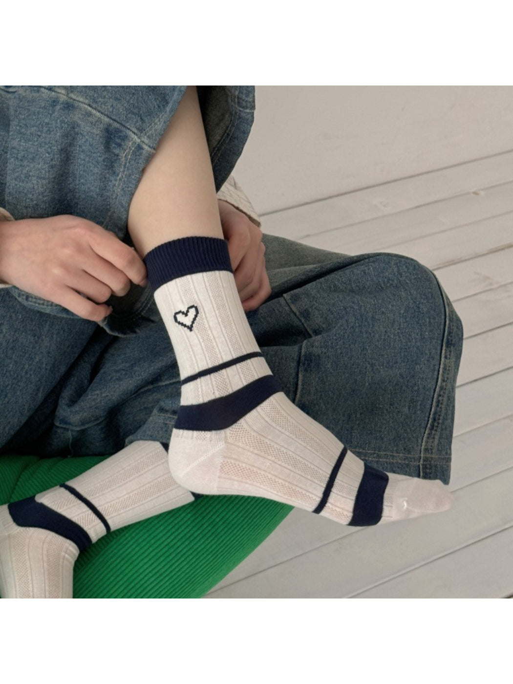Rufia colourblock socks displayed flat highlighting heart motif and pastel colors