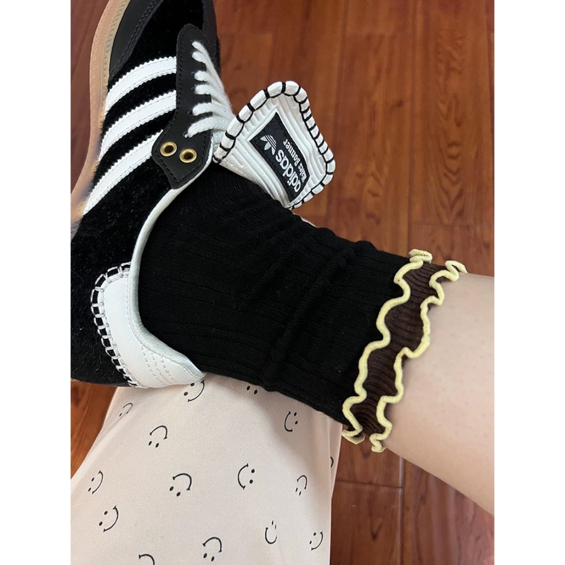 Rufia long socks paired with casual outfit, showing wave trim