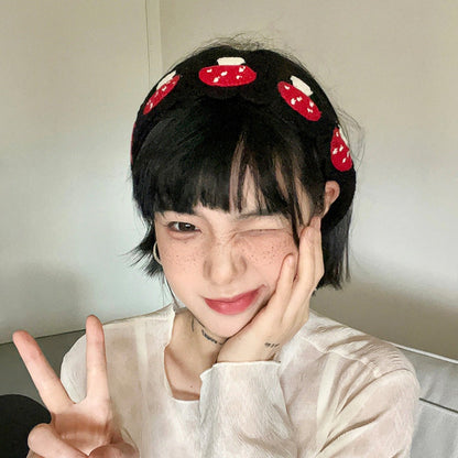 Haila crochet mushroom hairband styled with casual outfit on model outdoors