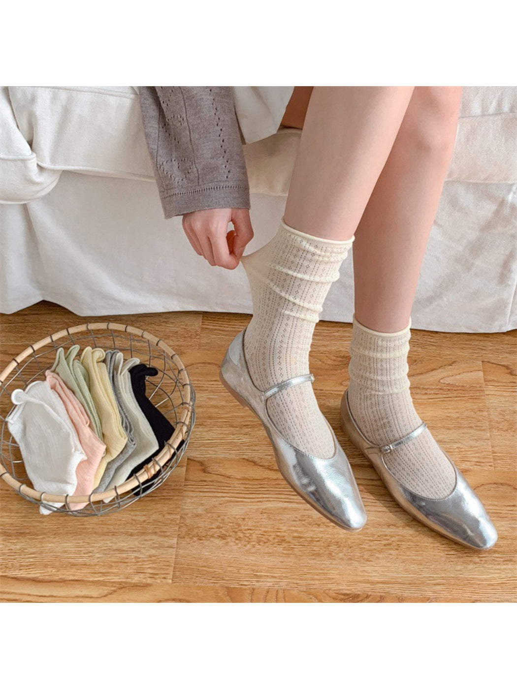 Pair of Rufia rolled edge textured crew socks in beige color laid flat