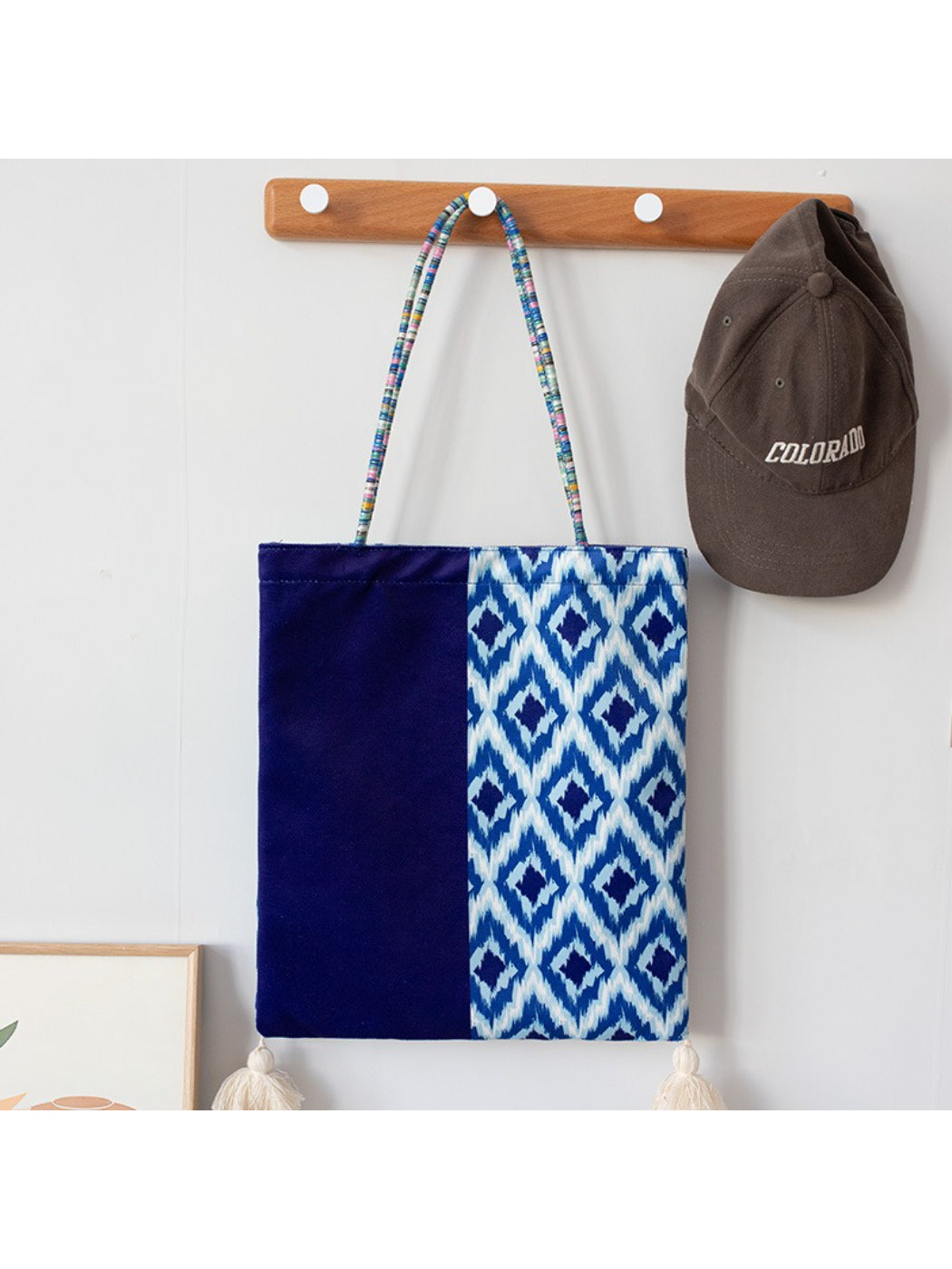 Cosbai Boho Ethnic Tassel Tote bag with ethnic pattern and tassels shown from side angle