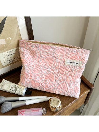Side view of Cosbai makeup bag highlighting and heart pattern