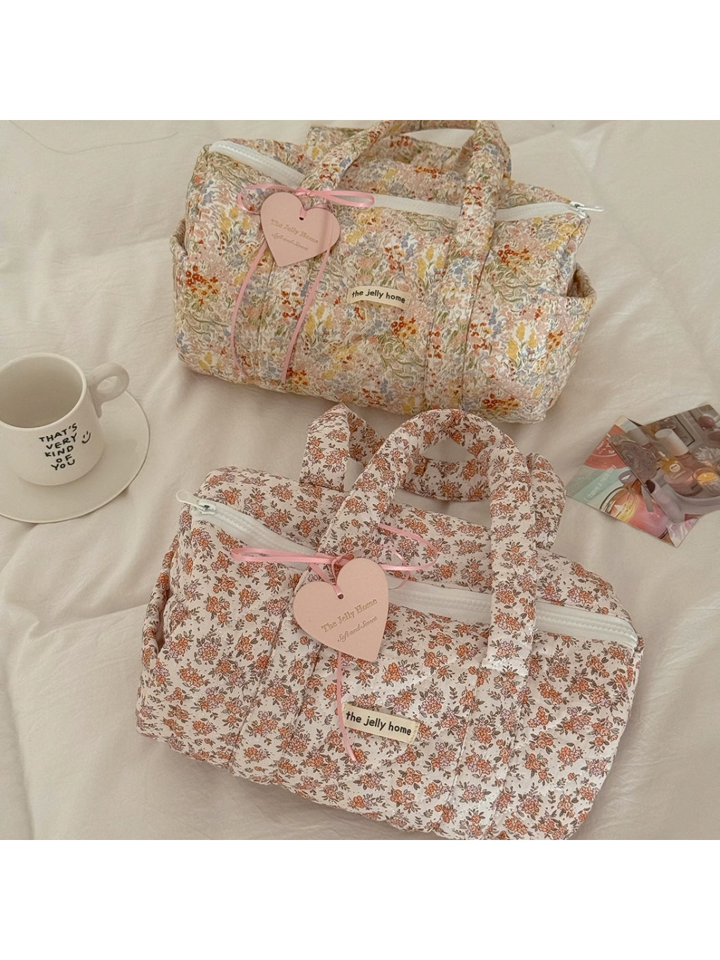 Cosbai Quilted Floral Duffle Bag front view with pink and green floral pattern