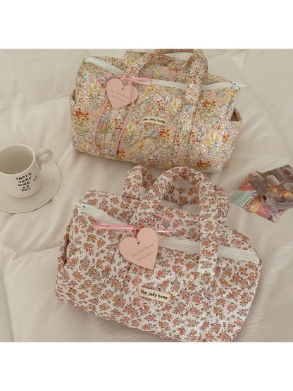 Cosbai Quilted Floral Duffle Bag front view with pink and green floral pattern