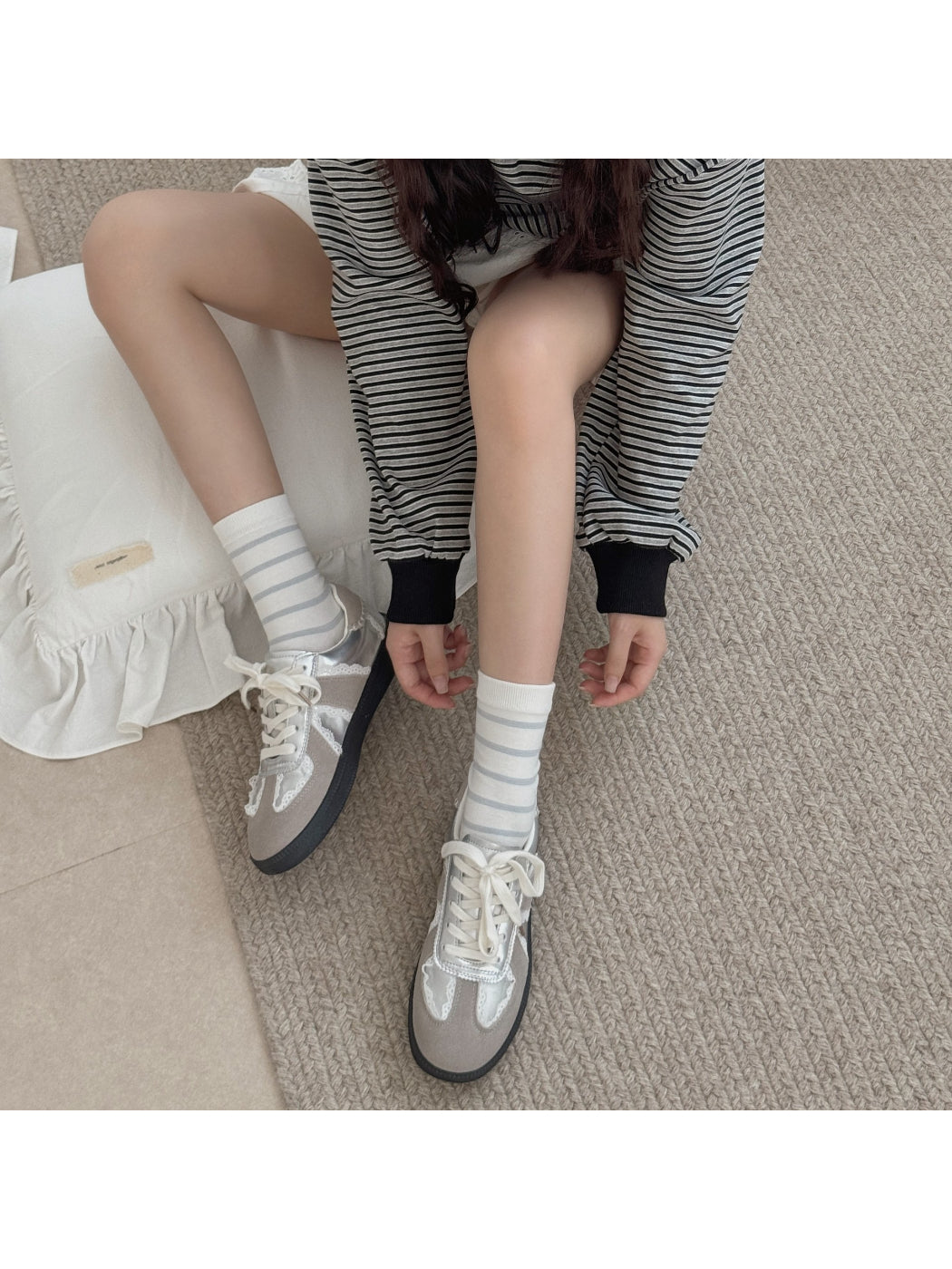 Rufia crew socks displayed flat showing ruffle edges and knit texture