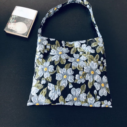 Cosbai Daisy Garden tote bag open to display spacious interior and inner pocket