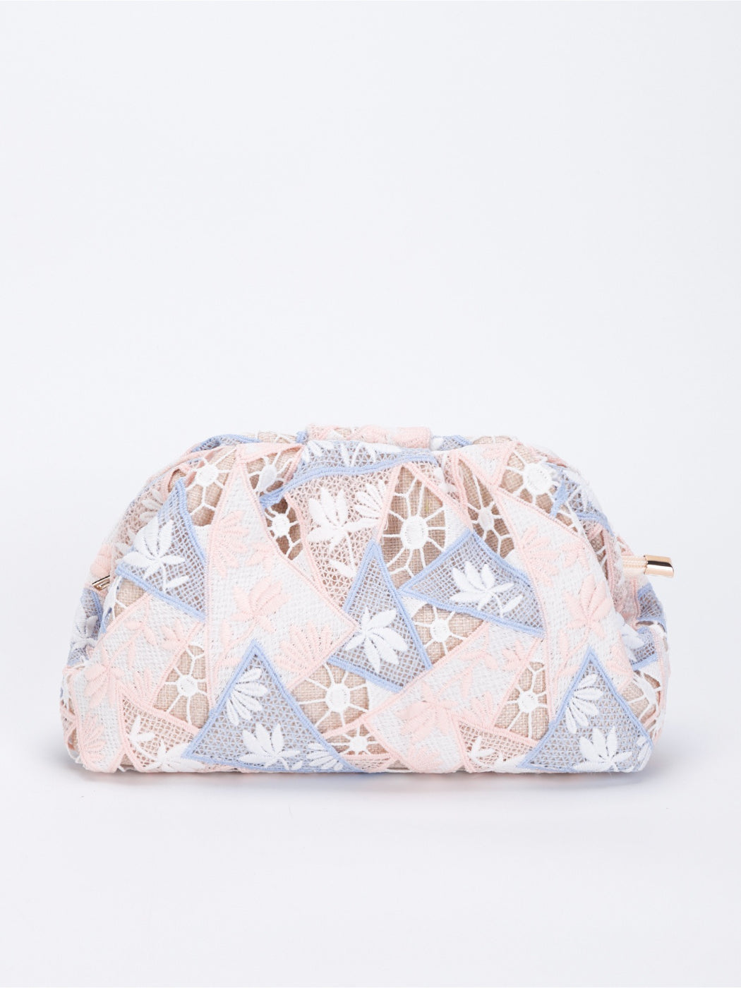 Cosbai crochet floral makeup pouch placed on wooden surface with flowers