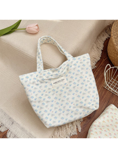 Cosbai small carry tote bag open showing interior space and lining