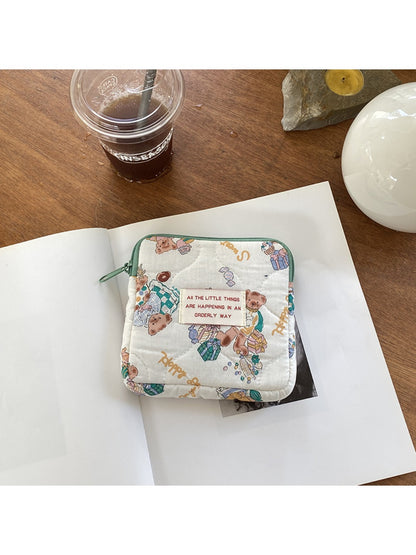 Cosbai cartoon print mini storage pouch displayed with slight shadow on white surface