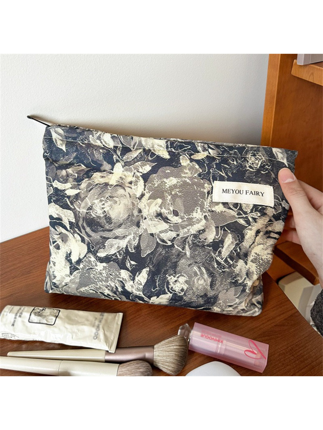 Close-up of Cosbai floral cosmetic pouch and fabric texture