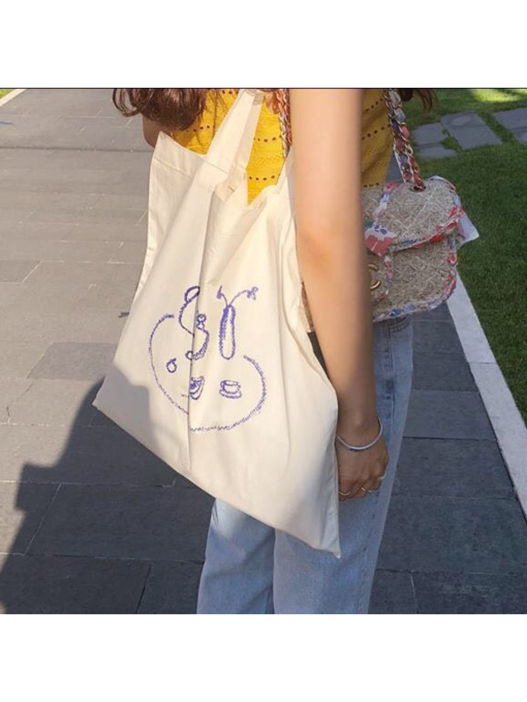 Close-up of Cosbai tote bag fabric showing detailed sketch print pattern