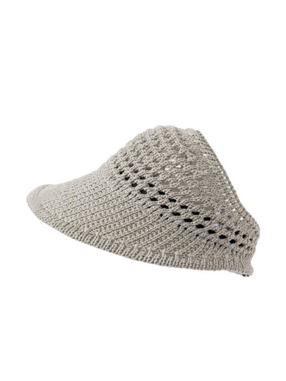Side view of Haila open knit wide brim sun hat showing knit texture and wide brim