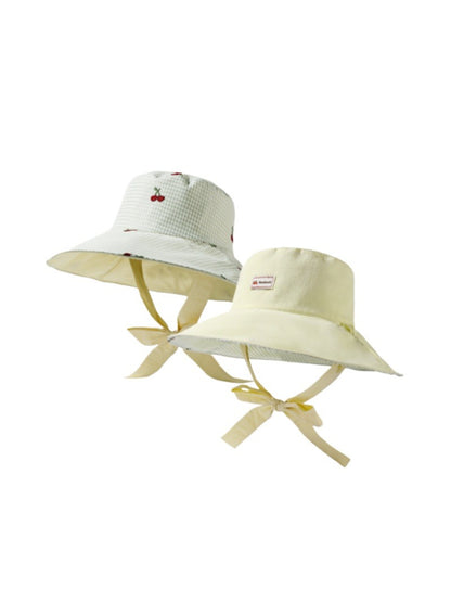 Haila reversible gingham brim hat flipped to solid black side, front view