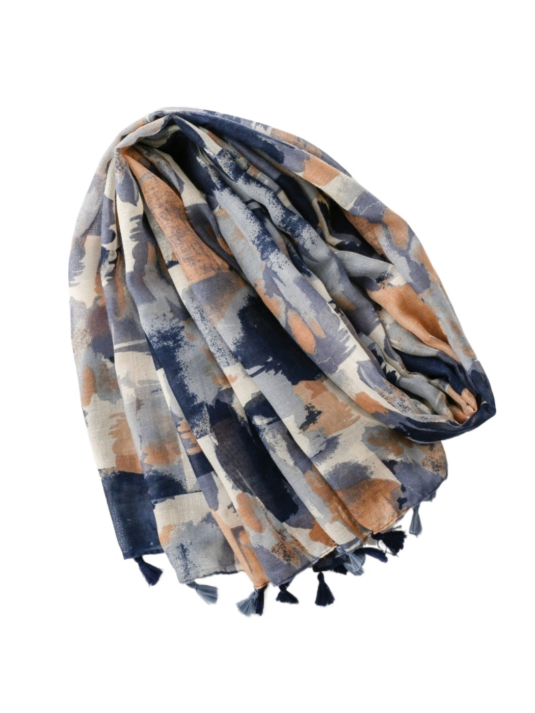 Close-up of Scarvii scarf fabric showing abstract brushstroke pattern and tassels