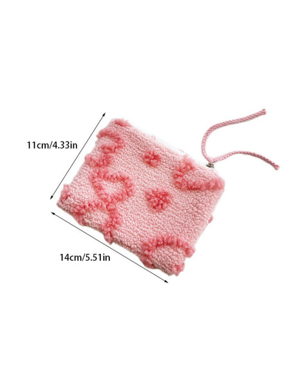 Close-up of the pull on the red plush heart gift pouch