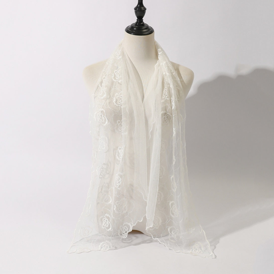Scarvii Floral Sketch Tulle Shawl Scarf draped over a chair
