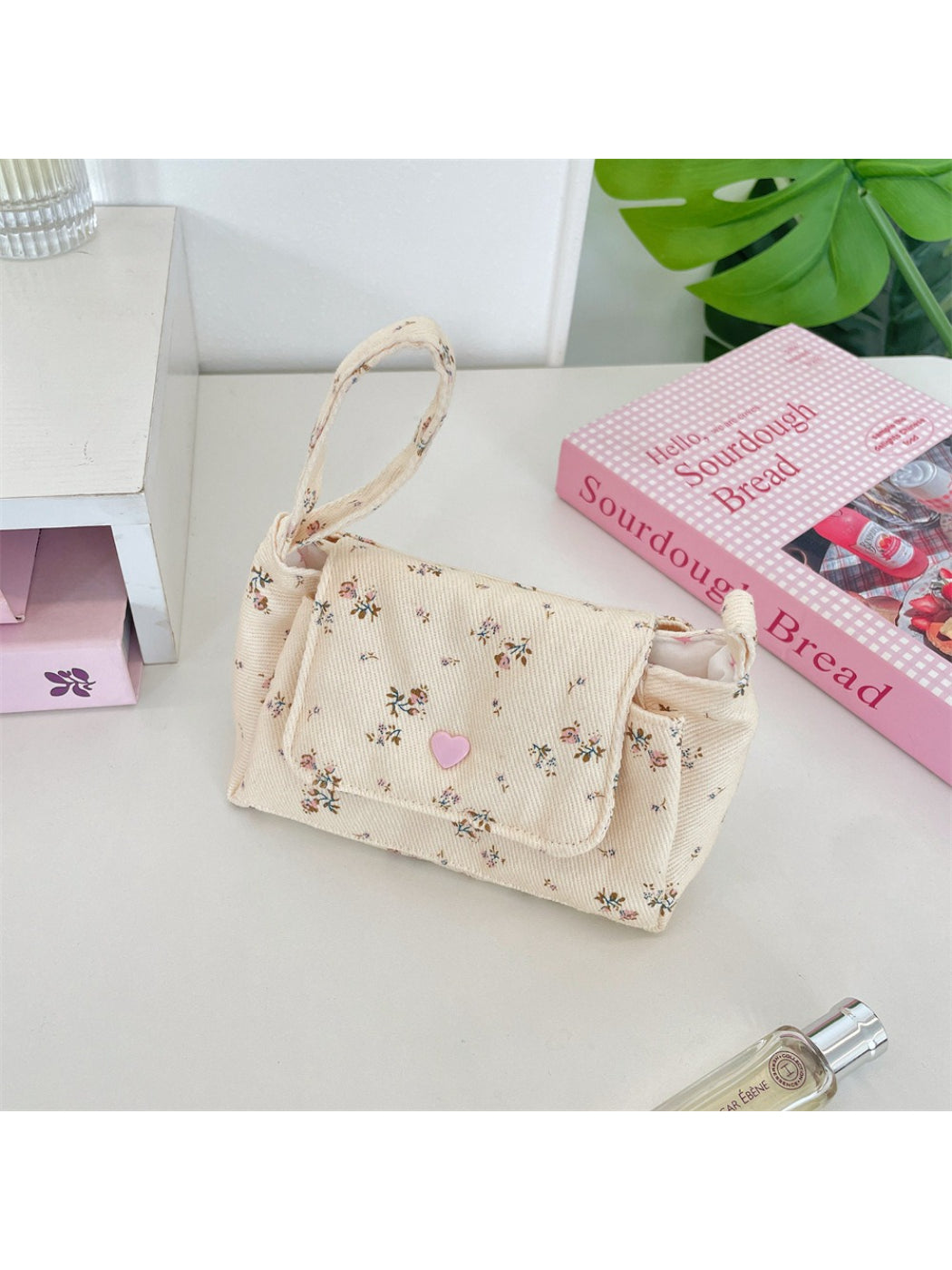 Close-up of floral print and stitching details on Cosbai Mini Handle Bag