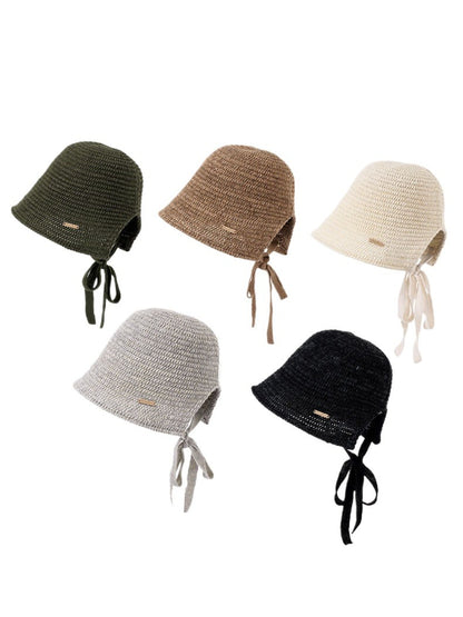 Haila crochet curve brim hat in beige displayed on a white background