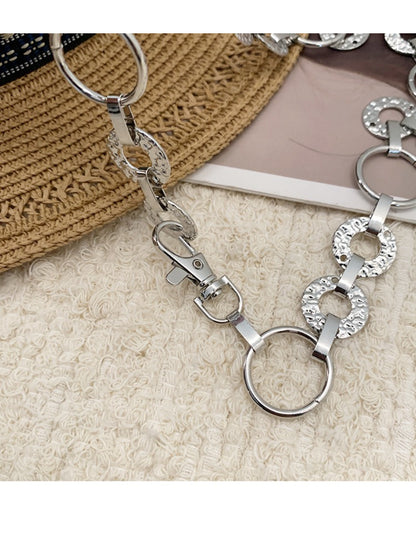 Beco waist belt laid flat showing full length and pendant charm