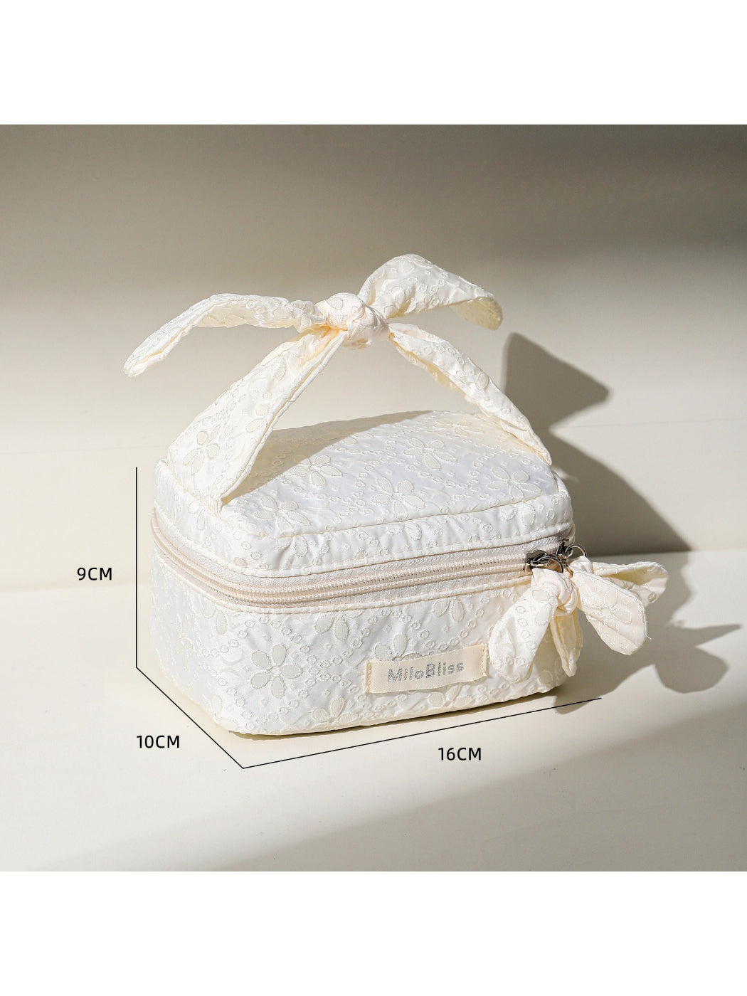 Open Cosbai Bow Top Handle Makeup Case displaying its interior layout