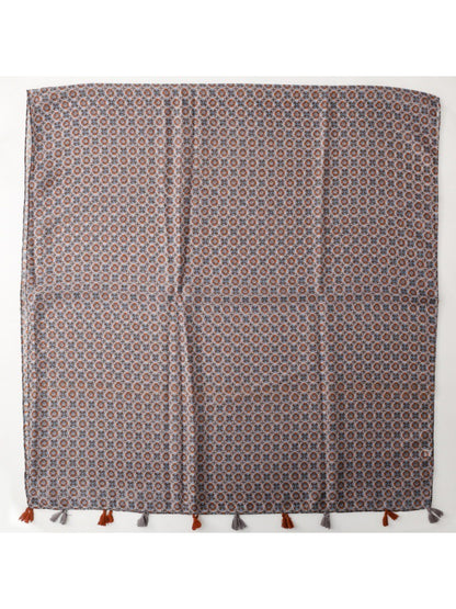 Fringe detail on scarf with small floral prints in muted tones