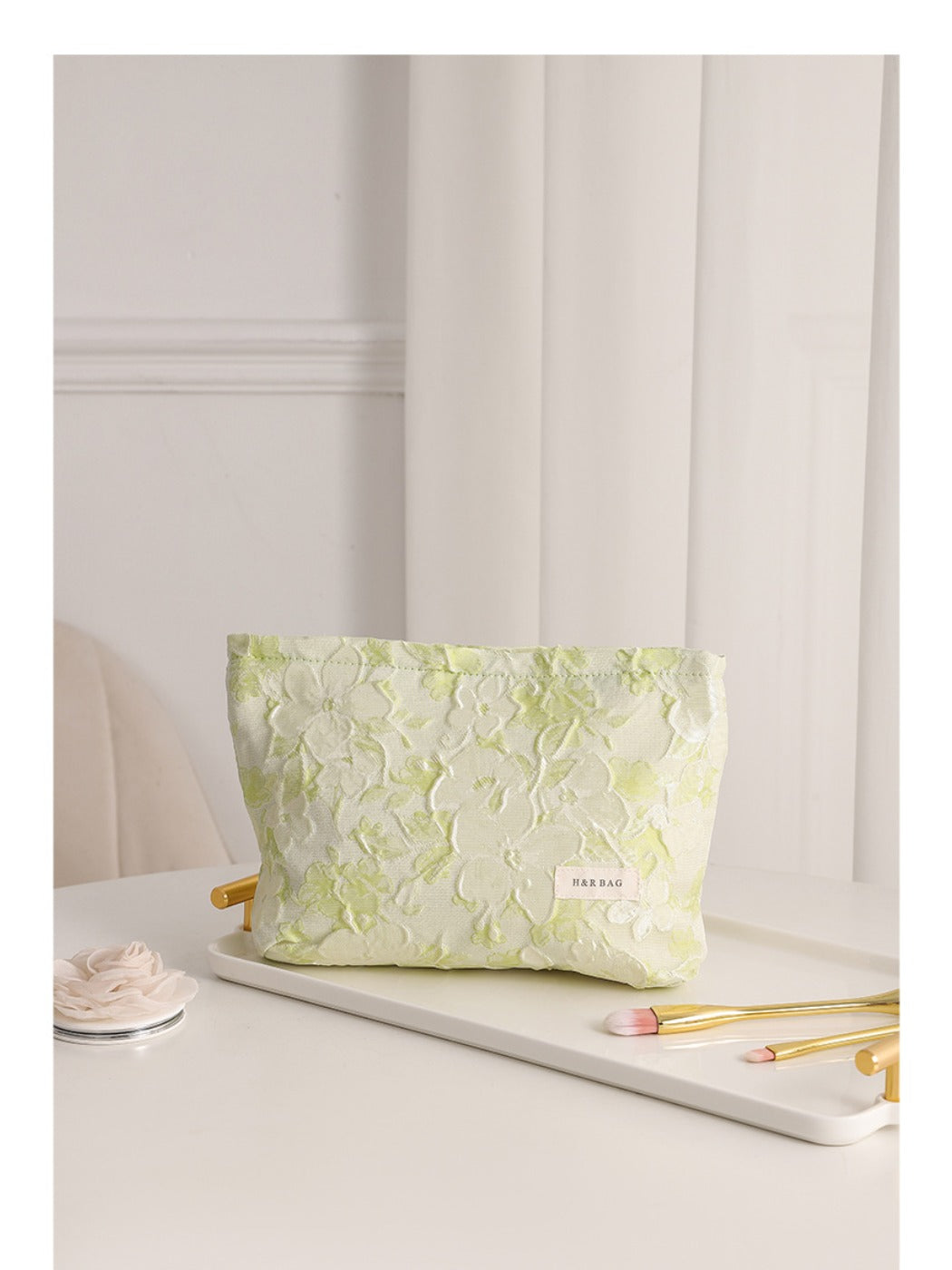 Cosbai floral cosmetic bag standing on a wooden surface with natural light
