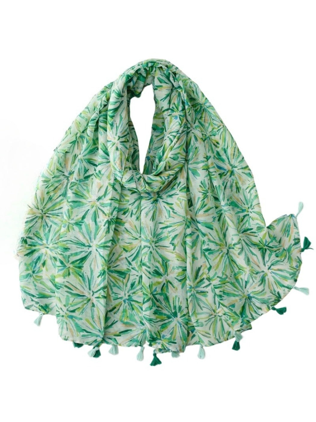 Green scarf with floral print and tassel edges laid flat