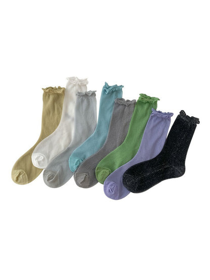Pair of Rufia soft sparkle everyday crew socks in light beige with subtle glitter