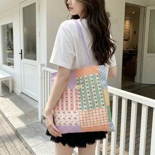 Close-up of Cosbai tote bag showing floral and checkered patchwork design