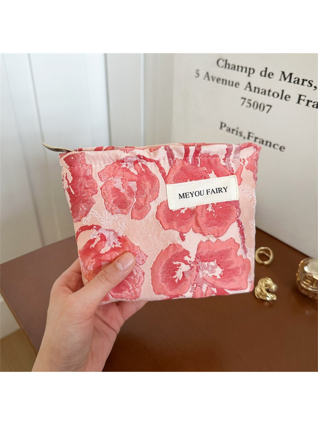 Cosbai Artistic Bloom cosmetic bag placed on a white surface