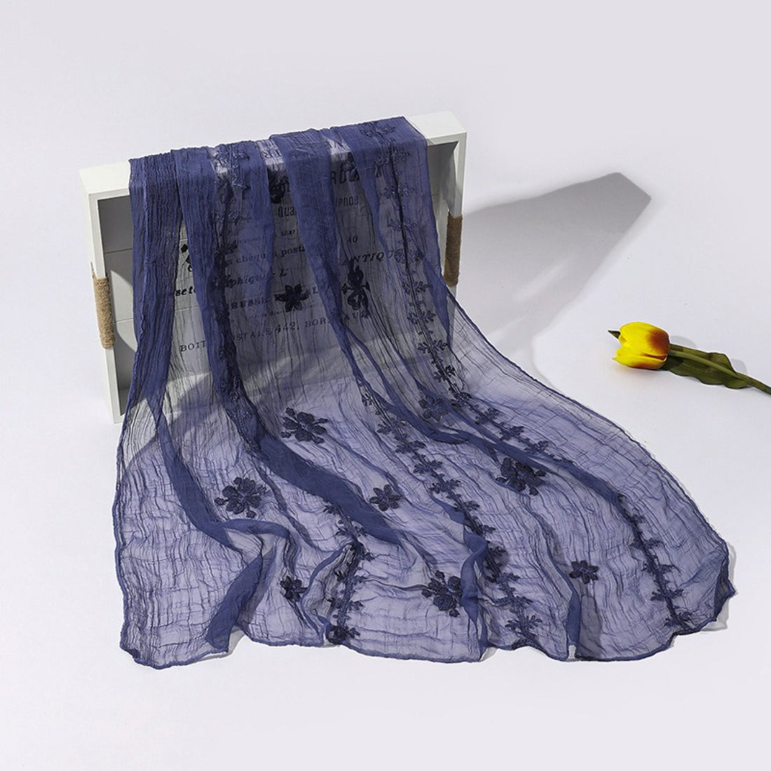 Scarvii lightweight scarf in soft hues with detailed blossom stitch close-up