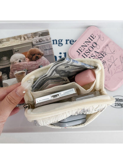 Close-up of quilted stitching and detail on Cosbai cartoon travel pouch