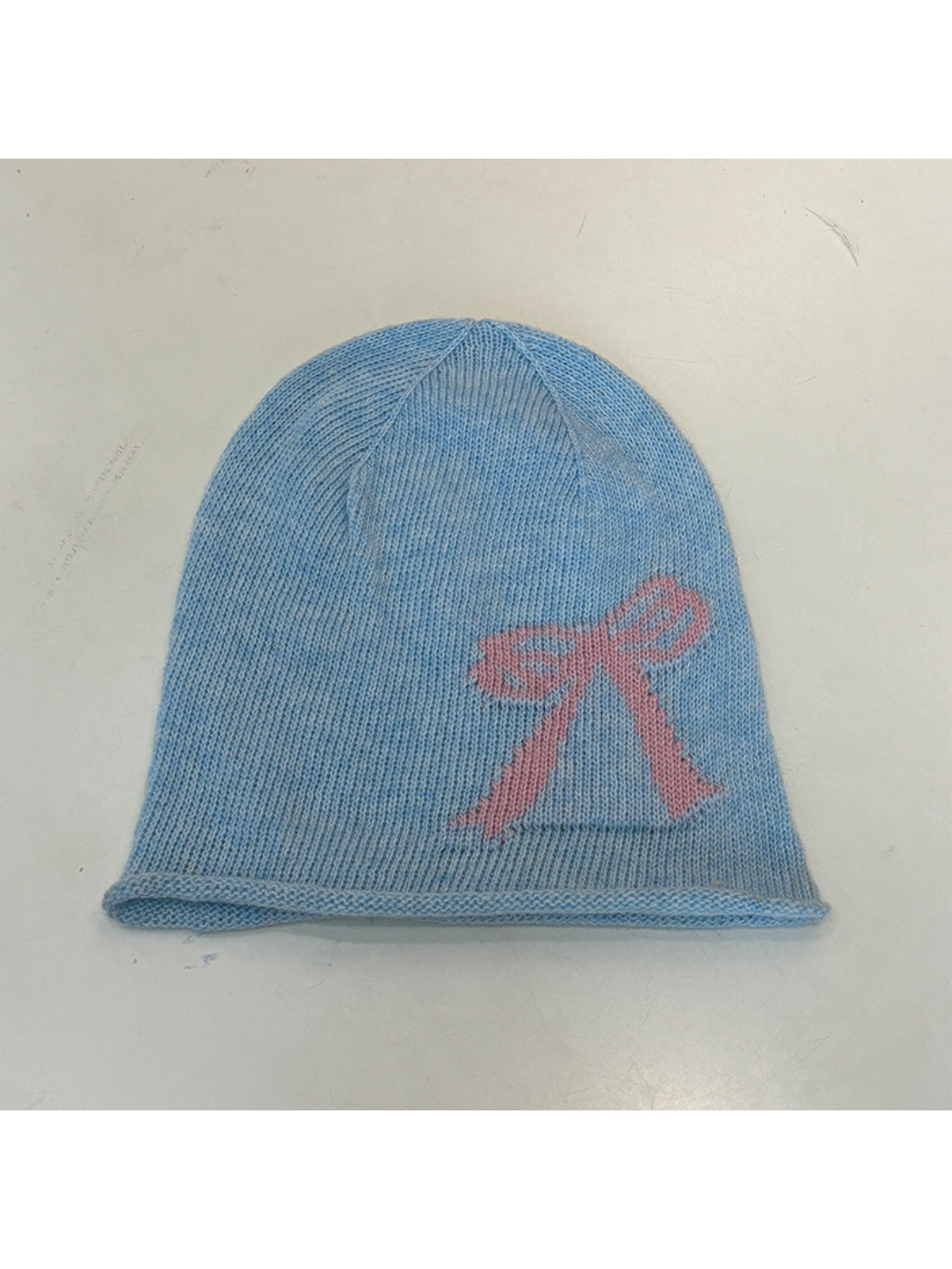 Haila - Bow and Cross Motif Rolled Edge Knit Beanie