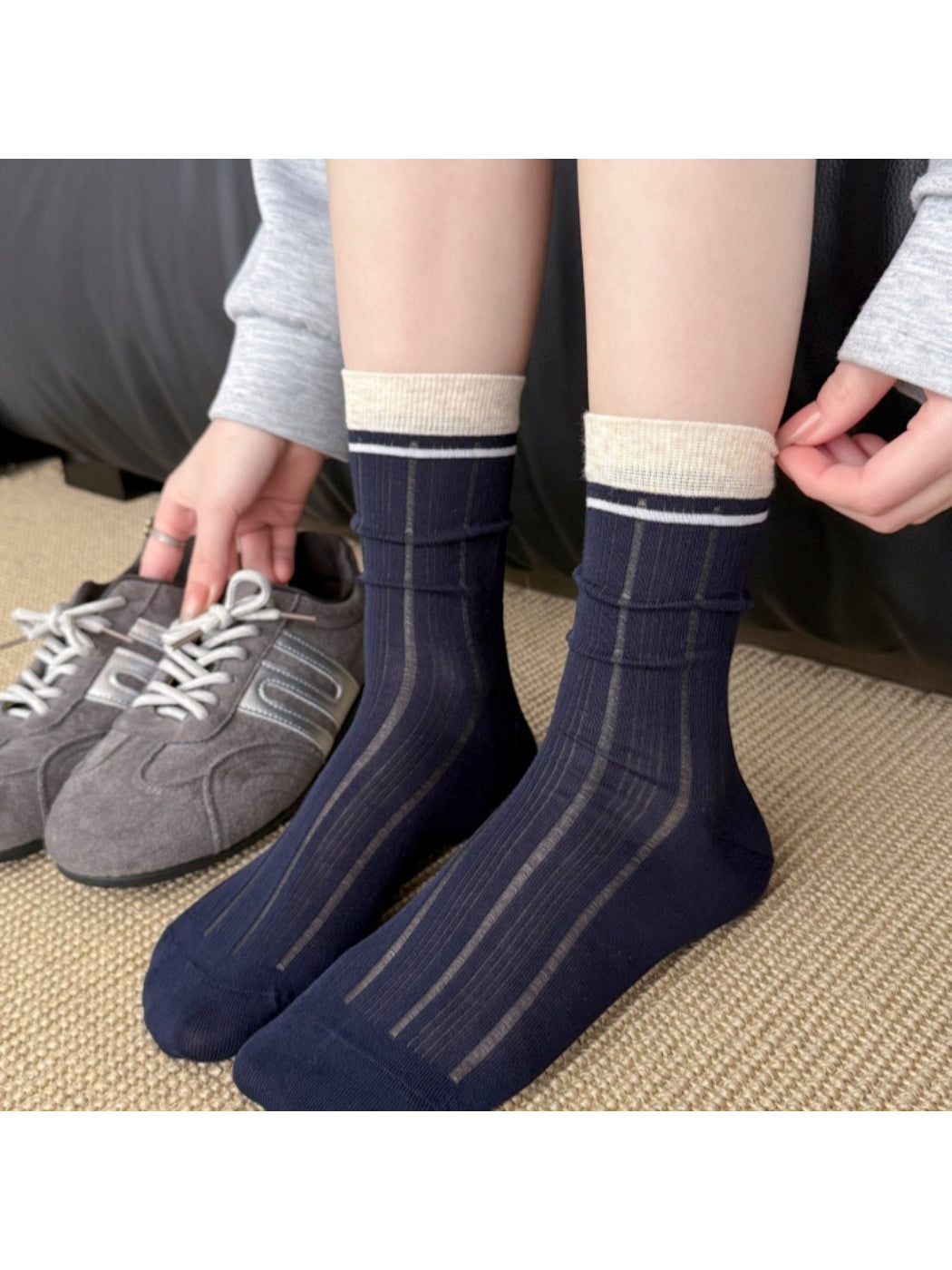 Model wearing Rufia ribbed mesh color block slouch socks with casual outfit