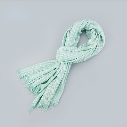 Scarvii striped scarf folded neatly with fringe detail visible