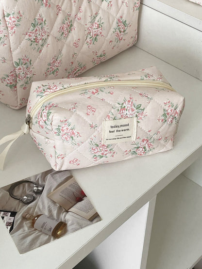 Inside view of Cosbai floral quilted makeup bag showing spacious and lining