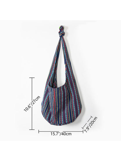 Close-up of Cosbai striped slouchy crossbody bag fabric and pattern