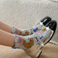 Rufia embossed floral mid-calf socks