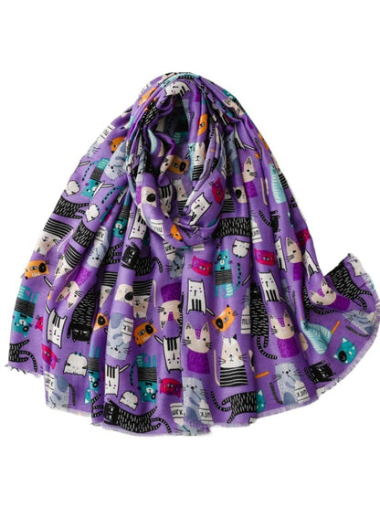 Folded Scarvii scarf showing multicoloured cat illustrations on lightweight material