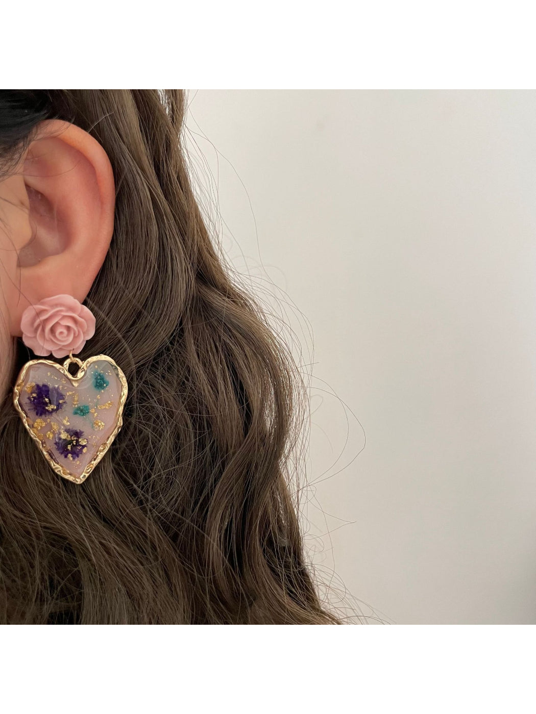 Earwish Rose Heart Drop Earrings worn on ear showcasing size and style