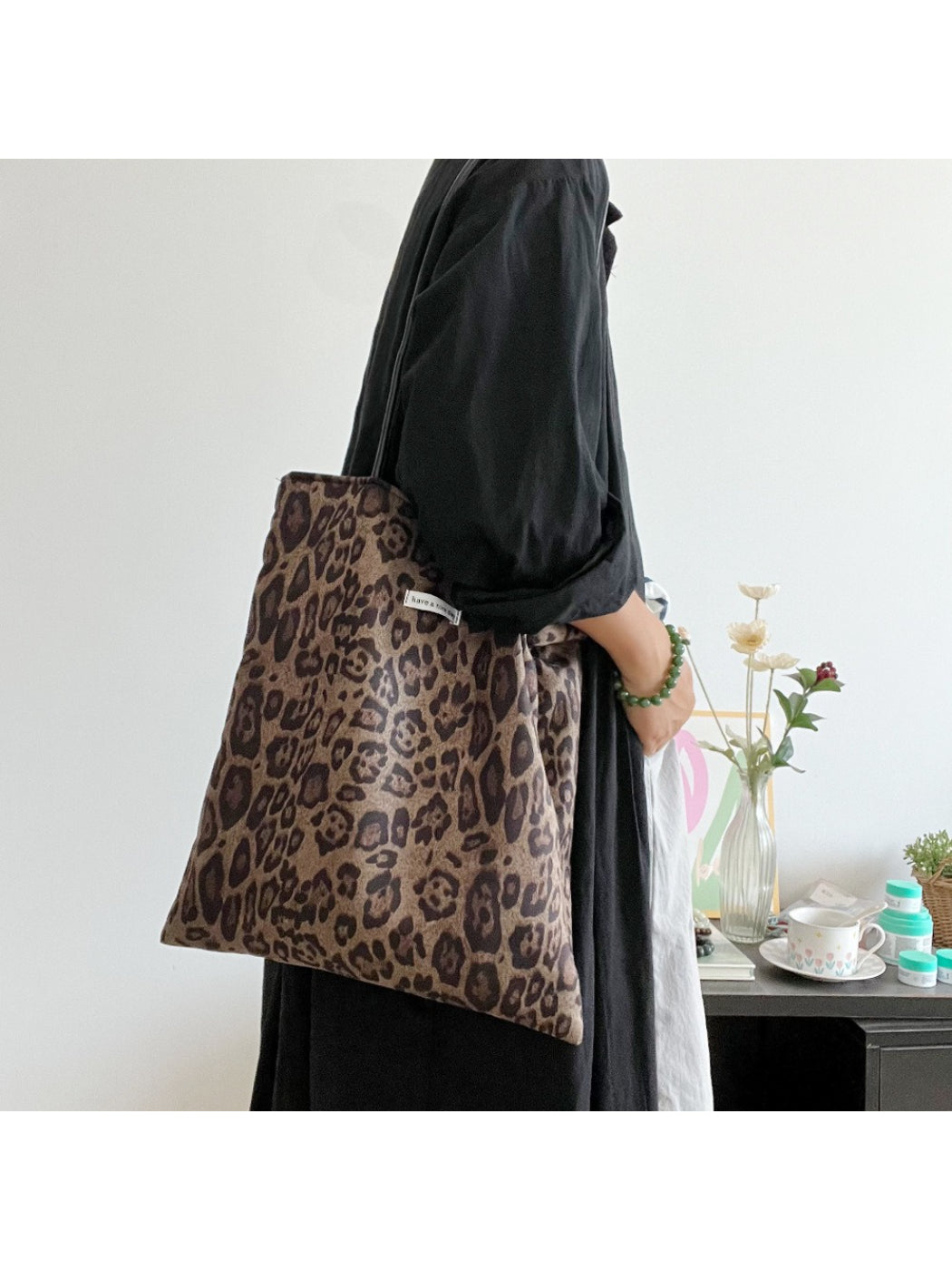 Close-up of Cosbai shopper bag showing leopard print texture and stitching details