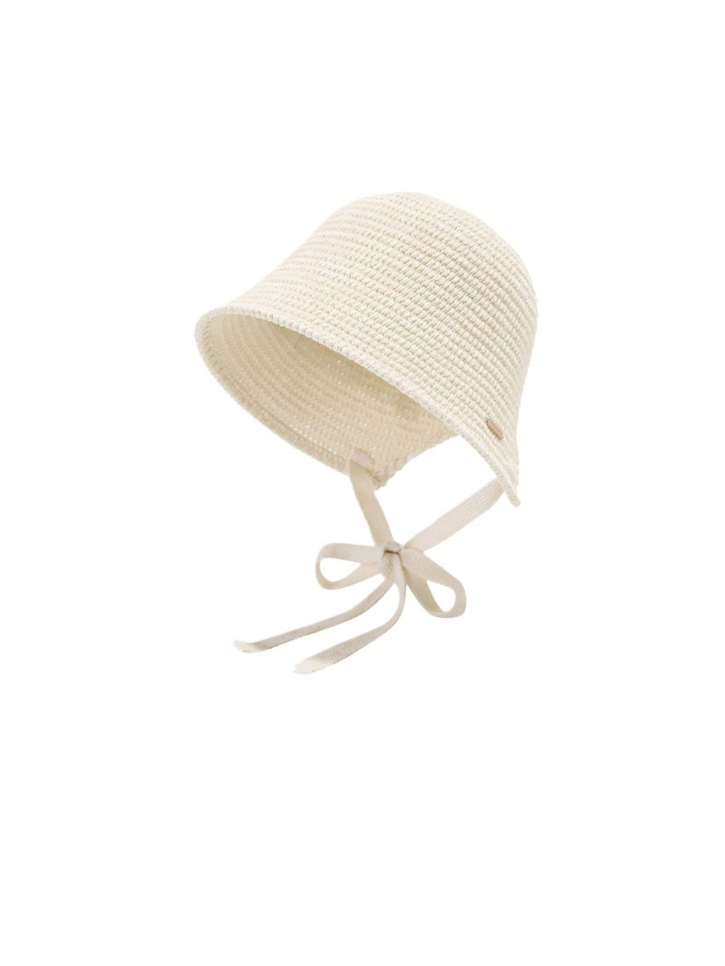 Haila woven straw bucket hat with ribbon tie shown from above on a flat surface