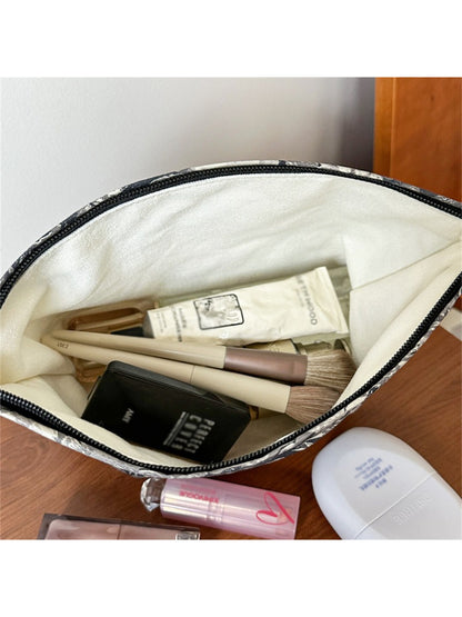 Side view of Cosbai floral cosmetic pouch highlighting its rectangular shape
