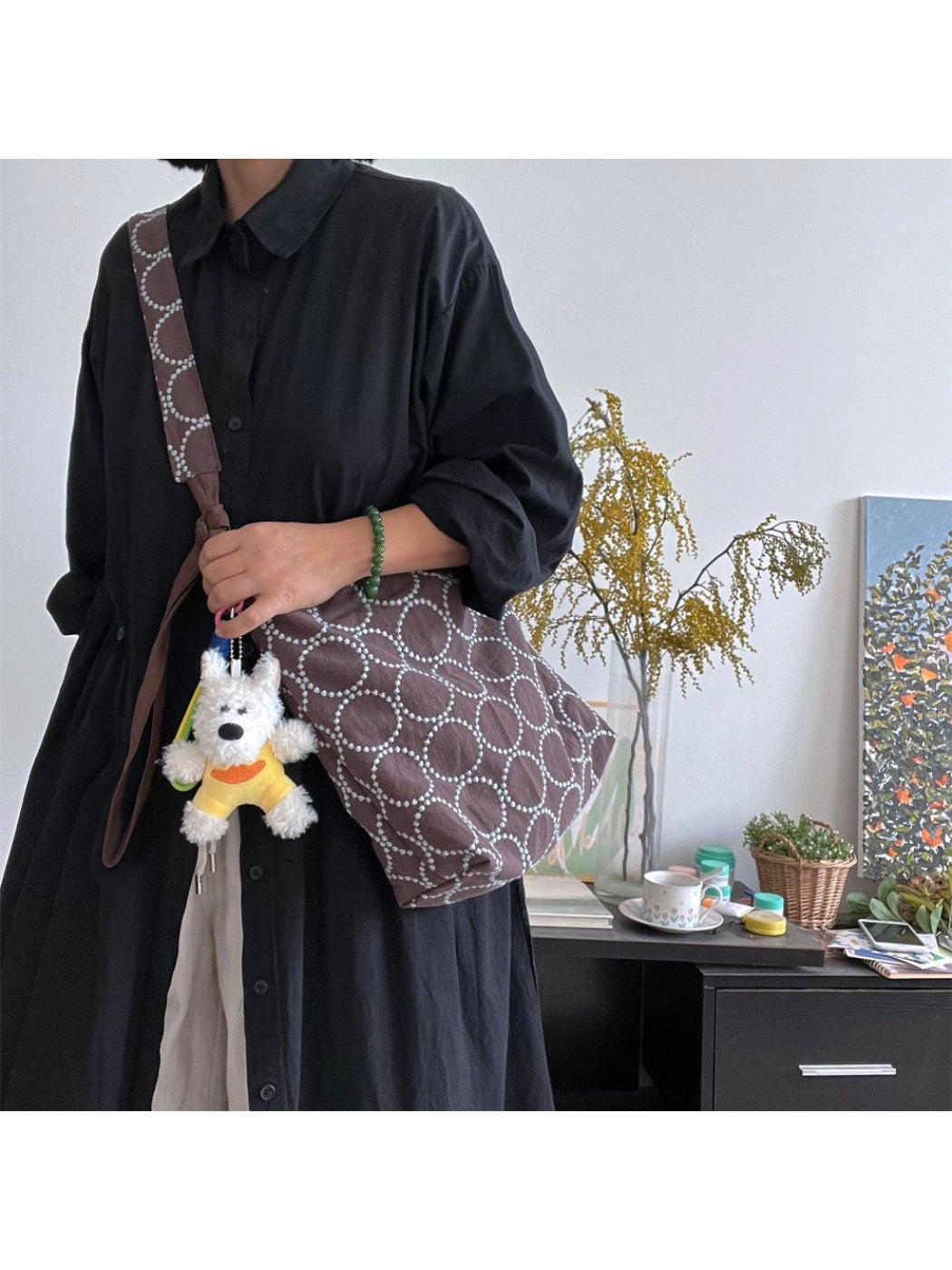 Cosbai Circle Print Tie Shoulder Bag worn on shoulder, showing size and fit