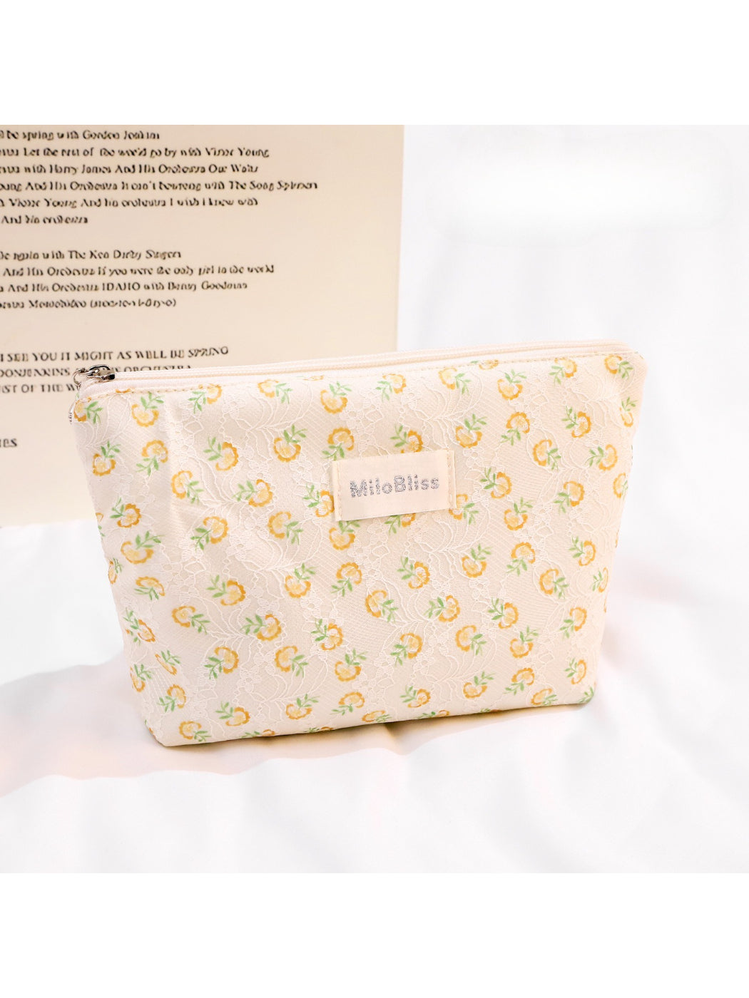 Side view of Cosbai small floral embroidered makeup cosmetic pouch highlighting embroidery